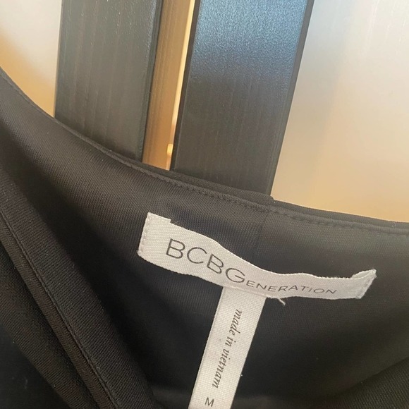 BCBGeneration off the shoulder women’s black dress. Size medium - Picture 7 of 10